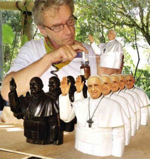CALMING EFFECT  Sculptor Peter Pinder produces bobblehead images of Pope Francis, which he says have a calming effect on motorists.  CONTRIBUTED PHOTO