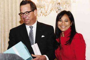 FILIPINO lawyer Aurora Austriaco, president of the  Chicago Bar Association (2012-2013),  with Peter Birnbaum, president and CEO of Attorneys’ Title Guaranty Fund Inc. 
