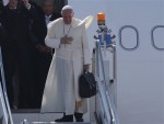 Pope Francis gestures before boarding his plane as he departs from Manila on Monday, Jan. 19, 2015. AP FILE PHOTO