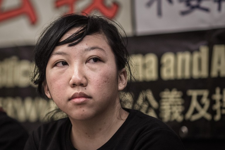 Indonesian former maid Erwiana Sulistyaningsih attends a press conference in Hong Kong on February 10, 2015 after her employer was convicted of beating her in a "torture" case that sparked international outrage and spotlighted the plight of migrant domestic workers in the Middle East and Asia. AFP