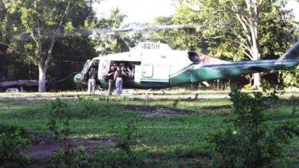 U.S. AID US forces use their helicopter to airlift Philippine police commandos wounded in a clash on Jan. 25, 2015, with Moro rebels from the Shariff Aguak Provincial Police command to a hospital in Camp Siongco in Datu Odin Sinsuat. FERDINAND CABRERA/Contributor 