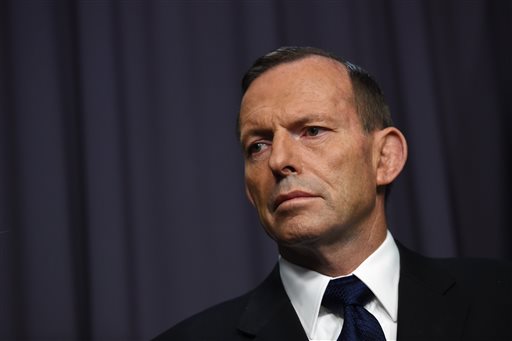 Australian Prime Minister Tony Abbott pauses as he speaks to the media during a press conference at Parliament House in Canberra, Australia, Wednesday, April 29, 2015. Abbott announced Australia withdrew its ambassador from Jakarta in response to the executions of two Australians, Myuran Sukumaran, 33, and Andrew Chan, 31.  LUKAS COCH/AAP IMAGE VIA AP 