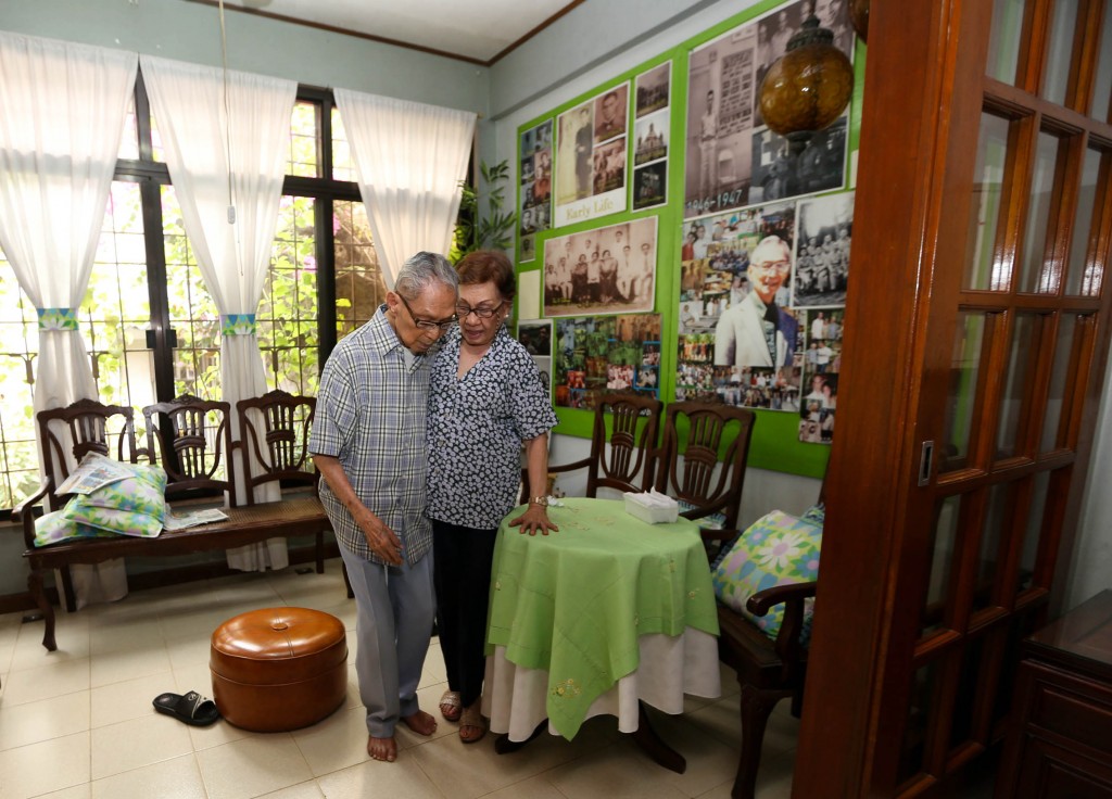 World War II veteran Dr. Jose Perez Javier, 105 years old, is assisted by his wife Filomena at their home in Quezon City. Javier was among those who survived the Death March.  INQUIRER PHOTO/LYN RILLON