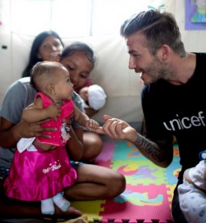 5 Beckham meeting babies and mothers who survived, credit UNICEF