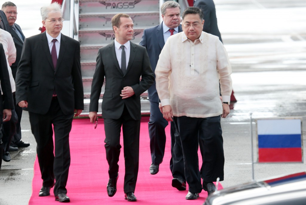 RUSSIAN PRIME MINISTER / NOVEMBER 18, 2015 Russian Prime Minister Dmitry Medvedev walks towards his offical car escorted by a Philippine Ambassador designate to the Russian Federation Carlos Sorreta upon his arrival on Wednesday, November 18, 2015, at the Ninoy Aquino International Airport (NAIA) terminal 1 to attend the on going Asia-Pacific Economic Cooperation (APEC) summit in the country. INQUIRER PHOTO / GRIG C. MONTEGRANDE