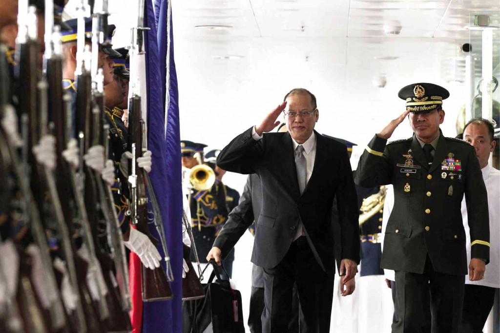 OFF TO ANOTHER SUMMIT President Aquino, accompanied by AFP Chief of Staff Gen. Hernando Iriberri, troops the line at Ninoy Aquino International Airport as he leaves for Kuala Lumpur, Malaysia, for the Association of Southeast Asian Nations summit on Friday, a day after hosting the Asia-Pacific Economic Cooperation summit. MALACAÑANG PHOTO BUREAU 