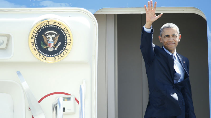 U.S. President Barack Obama waves as he boards Air Force One at the Ninoy Aquino International Airport after attending the Asia-Pacific Economic Cooperation (APEC) summit in Manila, Philippines, Friday, Nov. 20, 2015. (AP Photo/Wally Santana)