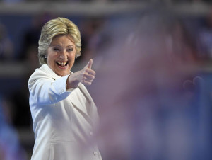 Democratic presidential nominee Hillary Clinton give a thumbs up after taking the stage to make her acceptance speech during the final day of the Democratic National Convention in Philadelphia , Thursday, July 28, 2016. (AP Photo/Mark J. Terrill)