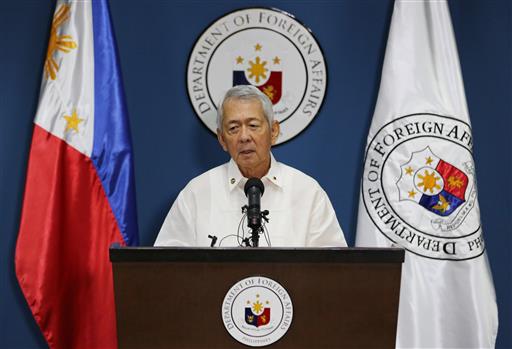 Philippine Foreign Affairs Secretary Perfecto Yasay Jr. issues a statement on the recent ruling in a long-running dispute between the Philippines and China over the South China Sea during a press conference in suburban Pasay, south of Manila, Philippines on Tuesday, July 12, 2016. An international tribunal has found that there is no legal basis for China's "nine-dash line" claiming rights to much of the South China Sea. The tribunal issued its ruling Tuesday in The Hague in response to an arbitration case brought by the Philippines against China. (AP Photo/Aaron Favila)