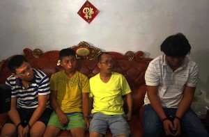 The police detained seven Chinese nationals (four seen in this photo) after a raid at a piggery farm led to a suspected shabu laboratory beneath a feeds warehouse in Barangay Balitucan in Magalang, Pampanga. Police discovered the facility on Wednesday (Sept. 7). PHOTO BY TONETTE T. OREJAS/INQUIRER CENTRAL LUZON 