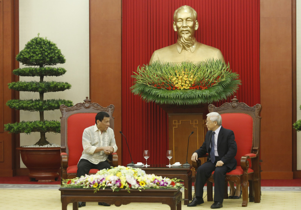 Philippine President Rodrigo Duterte, left, talks with Vietnam's Communist Party General Secretary Nguyen Phu Trong at the Party's headquarters in Hanoi, Vietnam, Thursday, Sept. 29, 2016. AP