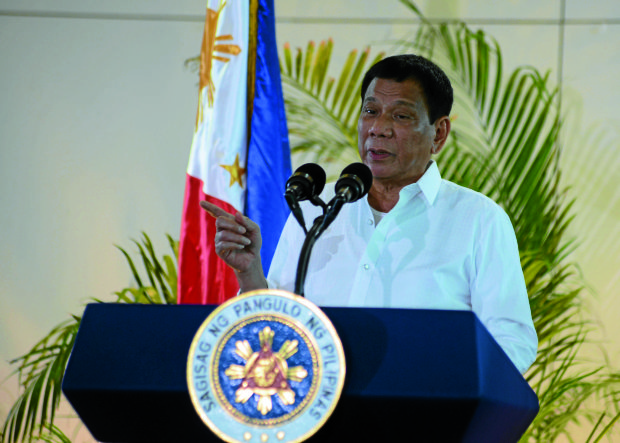 DEPARTURE TALK Before leaving for Peru to attend the Asia- Pacific Economic Cooperation summit, President Duterte discloses hismessage to Apec leaders: The Philippines is open for business. —BING GONZALES