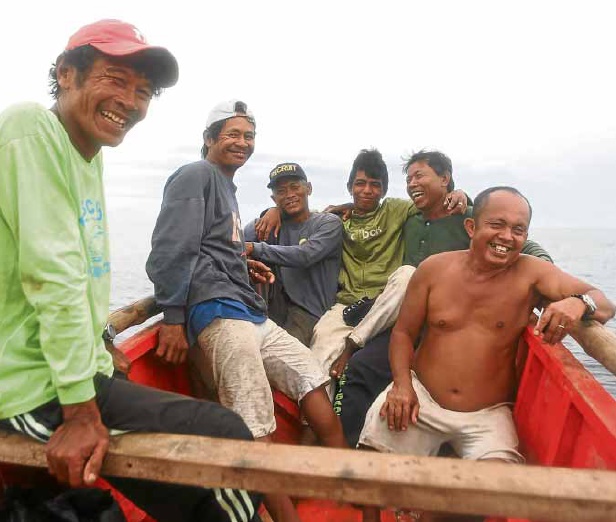 BACK FROM PANATAG Filipino fishermen are thankful that they were not harassed by Chinese coast guards when they returned to their traditional fishing ground at the disputed Panatag (Scarborough) Shoal off the coast of Zambales province. —REMZAMORA