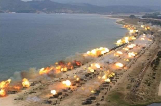 Balls for fire shoot out of the muzzles of hundreds of North Korean tanks and artillery pieces during the firing drill on April 26, 2017, which Pyongyang said was the largest ever. SCREENGRAB FROM NORTH KOREAN RODONG SINMUN