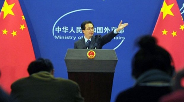 China's Ministry of Foreign Affairs spokesman Hong Lei gestures for questions at a press briefing in Beijing in this November 2010 file photo.   AFP