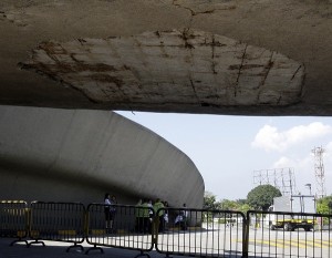 The plaster of the concrete ramp was remove to prevent from falling to pedestrians and motorists but remain unfinished Friday, Nov. 11 2011 at the Terminal 2 of Manila's international airport, Phillippines. The 30-year old international airport are finally getting a facelift after travel surveys voted the airport among the world's worst. (AP Photo/Pat Roque)