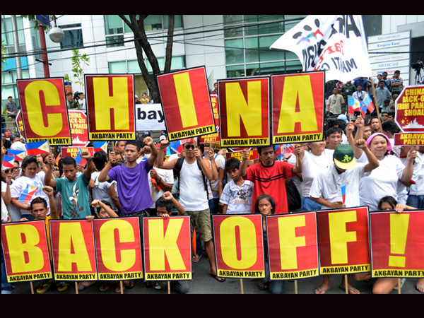 Filipino activists protests China's reclamation in disputed waters of the South China Sea. INQUIRER FILE PHOTO/KIRK RONCESVALLES