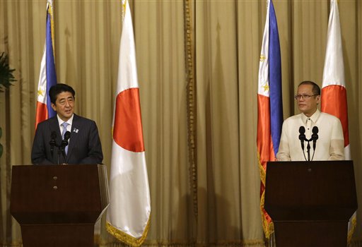 President Aquino (right) and Prime Minister Shinzo Abe are expected to examine China’s island-chain defense strategy as they open talks in Tokyo on Tuesday, June 24, 2014, to explore security cooperation in the face of Beijing’s increasing aggressiveness in asserting its territorial claims in the South China Sea. AP Photo
