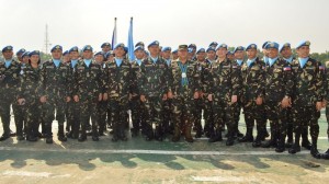 In this handout photo taken on October 2013 and released by Philippine Armed Forces public affairs office (AFP-PAO) on August 29, 2014 shows officers and men of the 7th Philippine peacekeeping force bound for the Golan Heights posing for photos during their send-off ceremony at the army heradquarters in Manila.  Heavily armed Philippine peacekeepers defied Syrian rebels on August 29 in a Golan Heights standoff hours after the gunmen disarmed and took hostage 43 Fijian soldiers there, Filipino authorities said. AP