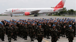 Philippine troops, who are to be deployed as U.N. Peacekeepers in Haiti, take their oath during sendoff ceremony Monday, Sept. 22, 2014 at Villamor Air Base at suburban Pasay city south of Manila, Philippines. Philippine President Benigno Aquino III said he's been told security threats on the Syrian side of the Golan Heights are not expected to ease soon, dimming hopes that U.N. peacekeepers can be deployed back to the region in the near future. Monday's sendoff came hours after the last batch of Filipino UN Peacekeepers arrived home after fighting rebels in Golan. (AP Photo/Bullit Marquez)