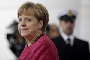 German Chancellor Angela Merkel arrives for a military welcome ceremony for the President of the Philippines, Benigno S. Aquino III. at the chancellery in Berlin, Germany, Friday, Sept. 19, 2014. (AP Photo/Michael Sohn
