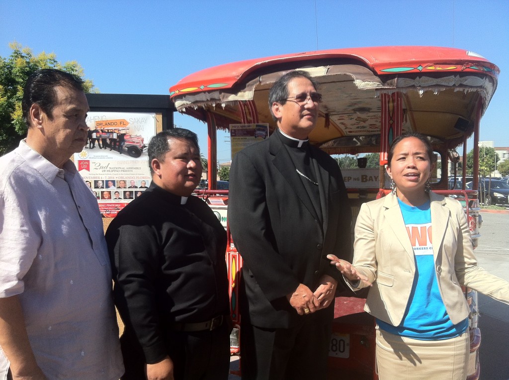 Jeepney in Carson City with Mayor Pro-Tem Elito Santarian (left) Bishop Oscar Solis (second from right) and Aquilina Soriano. PHOTO BY LAWRENCE C. OCHOA