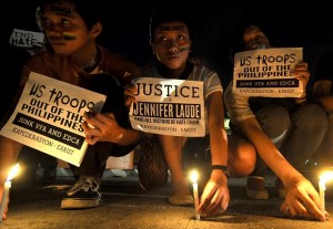 CANDLE LIGHTING CALL FOR JUSTICE SLAIN JENNIFER LAUDE / OCTOBER 14 2014 Members of LGBT group lights candle during a rally to call for justice on slain transgender Jennifer Laude along España Boulevard in Manila. INQUIRER PHOTO / RICHARD A. REYES / EXCLUSIVE FOR PDI NEWSPAPERS USE ONLY