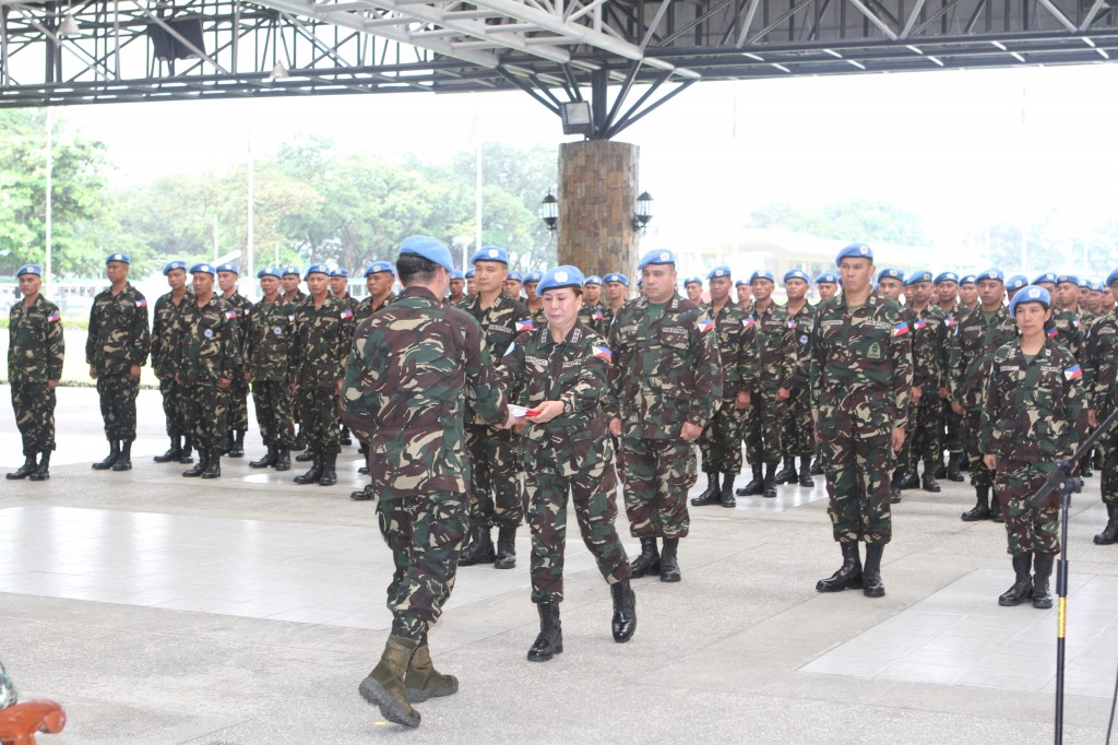 The Armed Forces of the Philippines on Wednesday welcomes home its UN Peacekeepers at Camp Aguinaldo after nearly a year of deployment in Haiti. / AFP PAO 