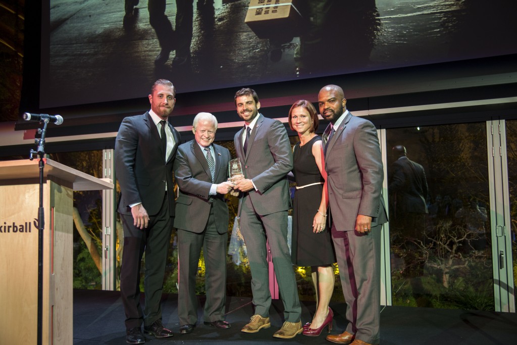 Ambassador Jose L. Cuisia, Jr. presents a plaque of commendation to members of Team Rubicon during ceremonies in Los Angeles on Friday, Nov. 7. CONTRIBUTED PHOTO