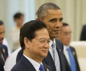 U.S. President Barack Obama, right, and Vietnamese Prime Minister Nguyen Tan Dung arrive at a U.S.-ASEAN (Association of South East Asian Nations East Asia) session at the Myanmar International Convention Center, Thursday, Nov. 13, 2014 in Naypyitaw, Myanmar. AP