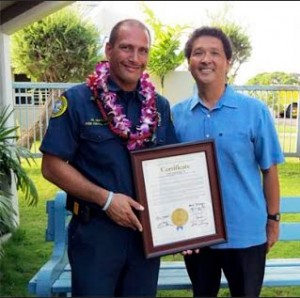 Honored firefighter Mark J. Inay with Honolulu Council Ron Menor. FILIPINO CHRONICLE PHOTO