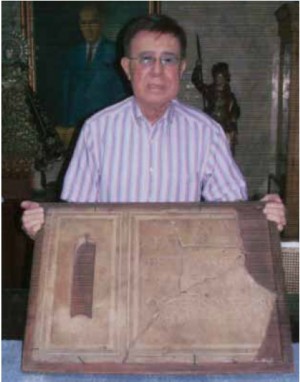 COLLECTORS COLLECTOR Former movie censors chief ManolingMorato, a well-known collector of antiquity, holds what he claims is the tombstone of St. Fabian that he bought from the grandnephews of 19th century Filipino master Felix Resurreccion Hidalgo. Morato says he wants to return the tombstone to the catacombs in Rome through Pope Francis or his representatives. CONTRIBUTED PHOTO