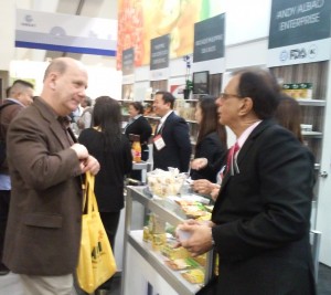 Nick Johnson of ASIAetc. confers with Filipino food  distributors on available goods
