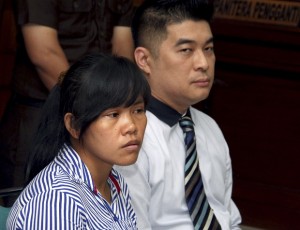 Philippine national Mary Jane Fiesta Veloso, left, who is on death row for drug offences, accompanied by an unidentified interpreter, attends her judicial review hearing at Sleman District Court in Yogyakarta, Indonesia, Wednesday, March 4, 2015. AP FILE PHOTO