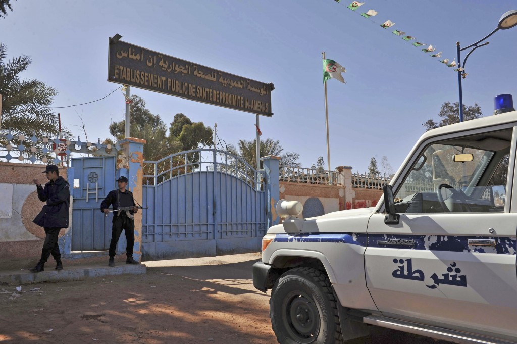 In this Jan. 19, 2013, file photo, Algerian special police unit officers guard the entrance of a hospital located near the gas plant where hostages have been kidnapped by Islamic militants, in Ain Amenas. Militants from the Islamic State affiliate in Libya kidnapped four nurses from the Philippines in broad daylight from a hospital in the city of Sirte, while several others were evacuated on Monday, March 16, 2015, a militia official said.  AP FILE PHOTO 