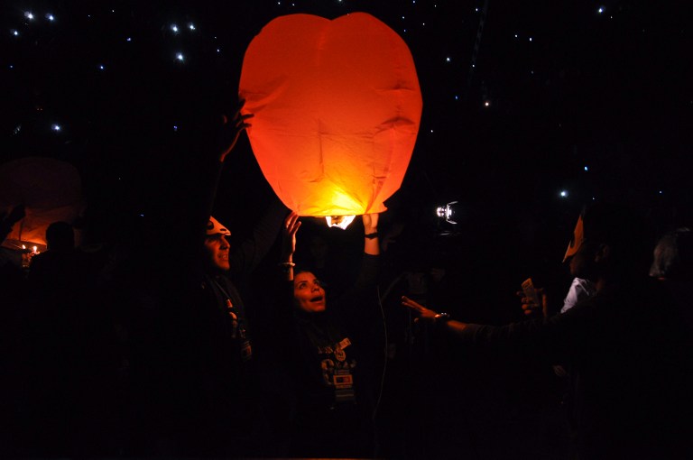 Tunisians light air balloons during the Earth Hour on March 29, 2014 at the Roman amphitheater of Carthage on the outskirts of Tunis. Thousands of cities around the world turned off lights Saturday emblematic buildings during the "Earth Hour", a global event to warn of the dangers of climate change. The campaign, which is to turn off the lights for one hour starting at 20:30 local time, was intended to raise funds for projects of environmental protection this year. AFP 