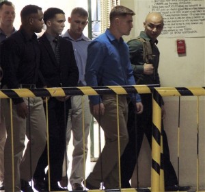 US Marine Pfc. Joseph Scott Pemberton, third left, the suspect in the Oct. 11, 2014, killing of Filipino transgender Jennifer Laude, is escorted into the courtroom for his scheduled trial Monday, March 23, 2015, at Olongapo City.  AP PHOTO/JUN DUMAGUING