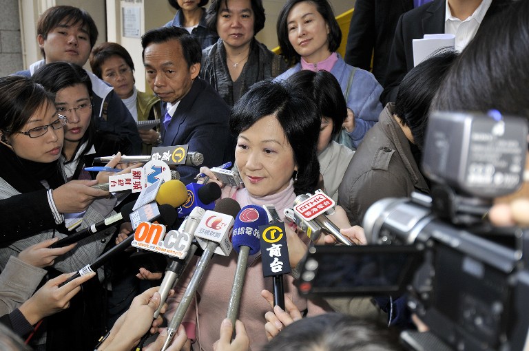 Hong Kong's ex-security chief and now lawmaker Regina Ip talks to the press in this December 2, 2007, file photo. She is under fire after she accused some Filipino domestic helpers of seducing their male employers, in comments branded “racist” and “offensive” by critics.  AFP PHOTO/ANDREW ROSS