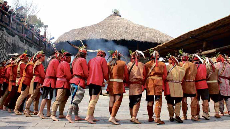MEN OF THE TSOU tribe of Taiwan form a circle and chant to begin their annual ritual, the Mayasvi, which honors the tribal warriors of the past. Most of the tribe live in the majestic Alishan mountain in southern Taiwan. TARRA QUISMUNDO