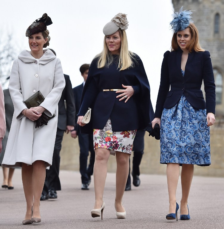 Britain's Sophie, Countess of Wessex, (L) Autumn Philips (C) and Britain's Princess Beatrice of York, (R) arrive for the Easter Sunday church service at St George's Chapel, Windsor Castle, in Windsor, west of London, on April 5, 2015. AFP 