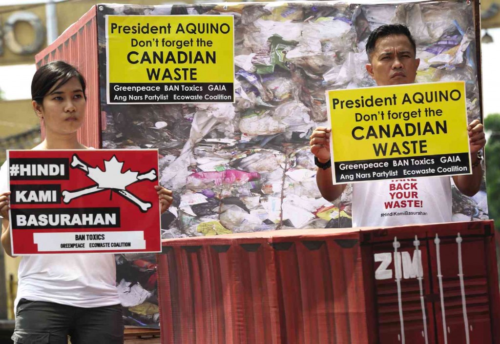 RETURN TO SENDER  Protesters tell Canada to take back tons of garbage illegally shipped to a port in Manila from Canada two years ago.  NIÑO JESUS ORBETA/FILE PHOTO 