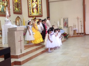 The procession's highlight--offering flowers to the Blessed Mother
