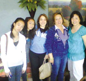 REUNITING WITH A CLOSE FRIEND (From left to right) Elena’s twins, Johanna and Rachelle, Imelda and Elena with Marion Wilson, a high school classmate of the two 