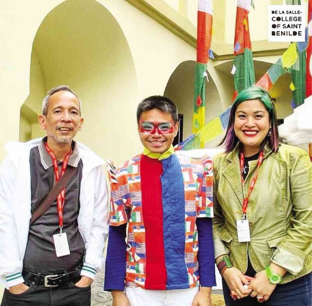 ART FOR THE WORLD With fellow designers from De La Salle-College of St. Benilde, Gabby Fernandez (left)  and Magda de Leon at the  main show of “Section of Countries and Regions” in Prague, Czech Republic. 