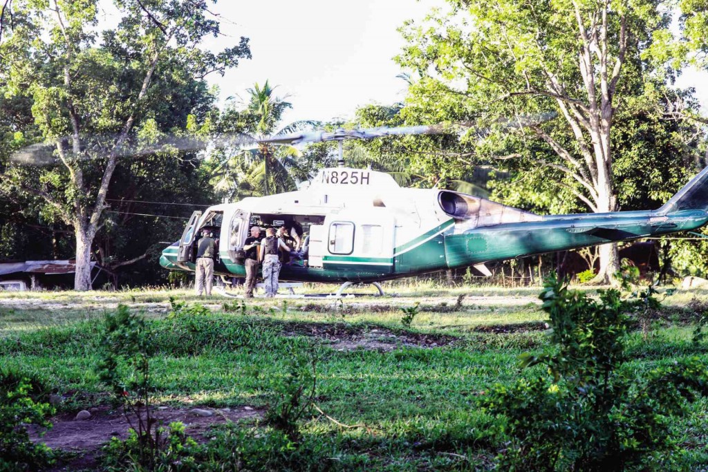 US FLYING AMBULANCE  US military personnel help carry wounded members of the police Special Action Force to a helicopter on Jan. 25 for transport to a hospital in Camp Siongco from the Shariff Aguak provincial police command in Maguindanao province.  FERDINAND CABRERA/CONTRIBUTOR