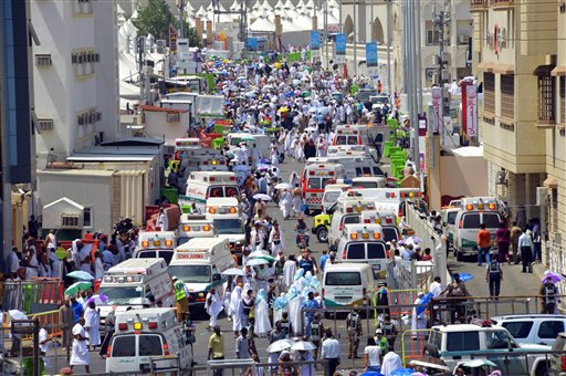 This image released by the Saudi Press Agency, SPA, shows ambulances in Mecca, after people were crushed by overcrowding in Mina, Saudi Arabia during the annual hajj pilgrimage on Thursday, Sept. 24, 2015. Hundreds were killed and injured, Saudi authorities said. The crush happened in Mina, a large valley about five kilometers (three miles) from the holy city of Mecca that has been the site of hajj stampedes in years past. (Saudi Press Agency via AP)