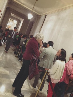 line for those who want to participate in hearing