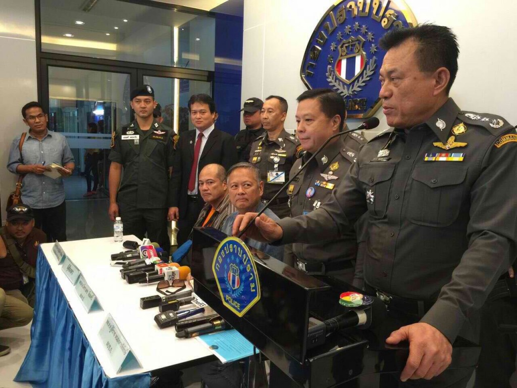 Seated from left to right: Mario Reyes, Joel Reyes, flanked by Thai police. DOJ PHOTO 