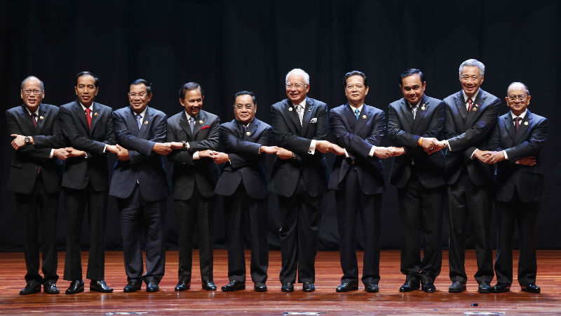 ASEAN Leaders from left to right, Philippines' President Benigno Aquino III, Indonesia's President Joko Widodo, Cambodia's Prime Minister Hun Sen, Brunei's Sultan Hassanal Bolkiah, Laos' Prime Minister Thongsing Thammavong, Malaysian Prime Minister Najib Razak, Vietnam's Prime Minister Nguyen Tan Dung, Thailand's Prime Minister Prayuth Chan-o-cha, Singapore's Prime Minister Lee Hsien Loong and Myanmar's President Thein Sein pose for photographs during opening ceremony of the Association of Southeast Asian Nations (ASEAN) summit in Kuala Lumpur, Malaysia, Saturday, Nov. 21, 2015. (AP Photo/Vincent Thian)