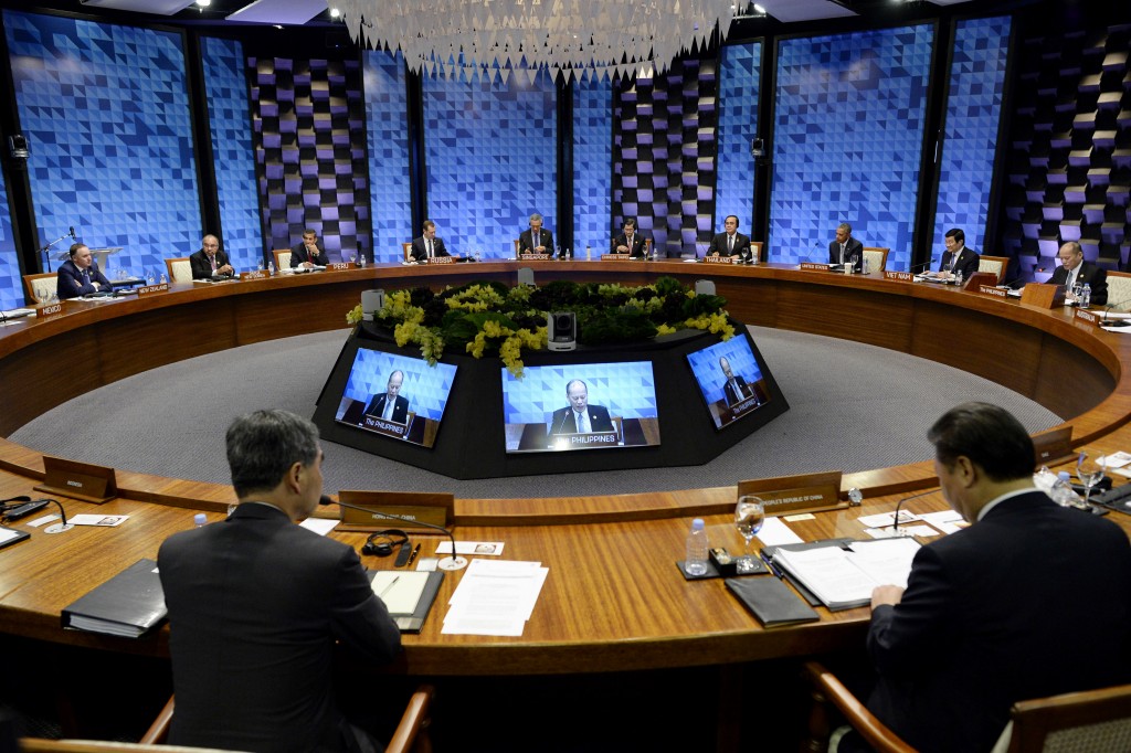 Leaders start the opening plenary session at the Asia-Pacific Economic Cooperation (APEC) Summit in Manila, Philippines, Thursday, Nov. 19, 2015. Asia-Pacific leaders called Thursday for increased international cooperation in the fight against terrorism as they held annual talks overshadowed by the Paris attacks. (Noel Celis/Pool Photo via AP)